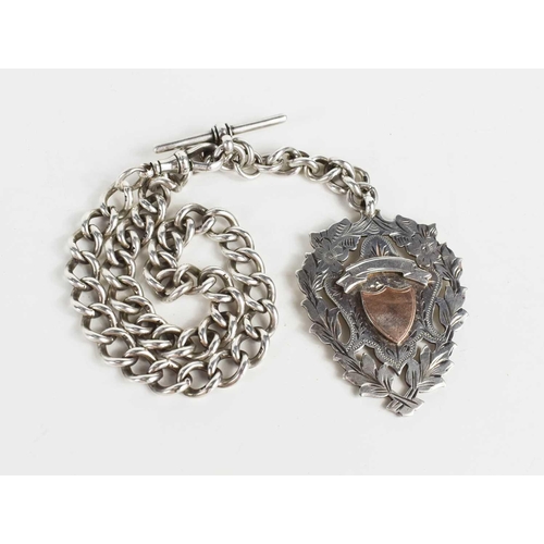 145 - A silver albert chain with bar and crab claw clasp, and a silver fob with vacant shield to the centr... 