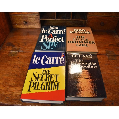 18 - John le Carre: A collection of four hardback first edition books by John le Carre with dust jackets,... 