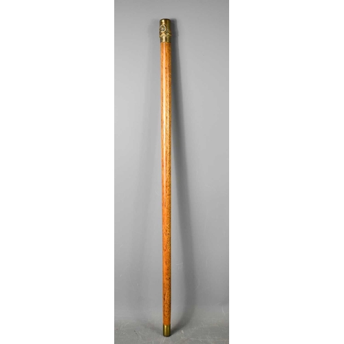 An antique Royal Artillery oak and brass walking cane.