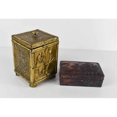 240 - A 19th century brass clad tea canister, likely dutch, each panel embossed with decoration, one of tw... 