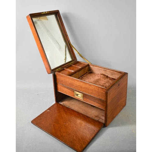 251 - A Victorian Campaign style mahogany Gentleman's vanity case, with inset brass handle to the top, mir... 