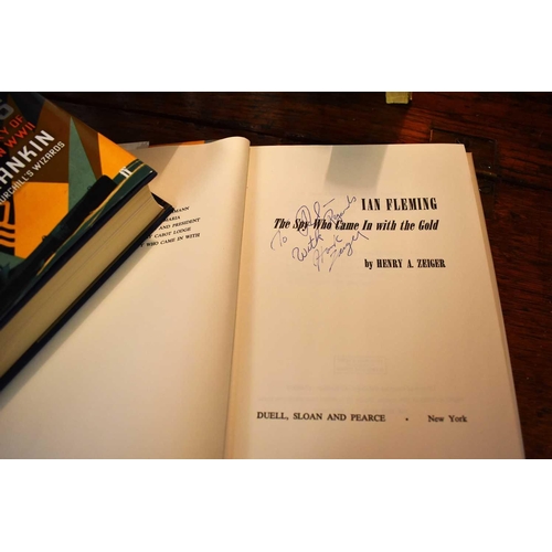 31 - A collection of books related to Ian Fleming and James Bond, to include a first edition of Ian Flemi... 