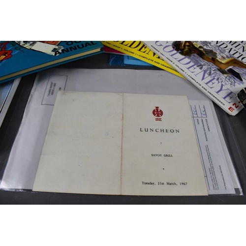 36 - A collection of vintage and retro James Bond ephemera, to include a James Bond luncheon menu card fr... 