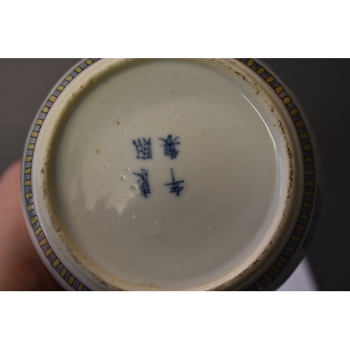 116 - A late 19th century Qing Dynasty Chinese porcelain teapot, the fluted, squat, circular body painted ... 