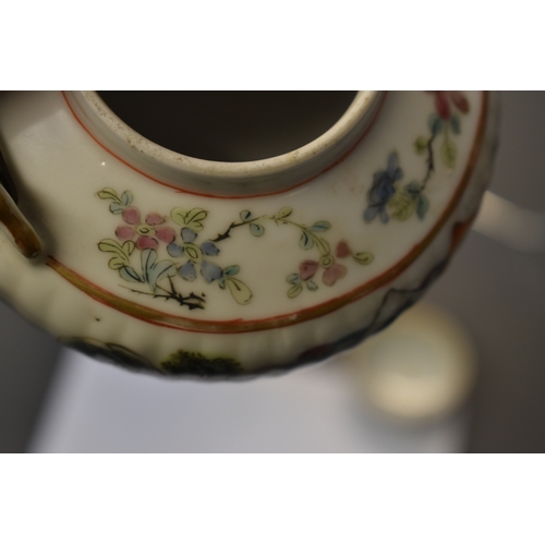 116 - A late 19th century Qing Dynasty Chinese porcelain teapot, the fluted, squat, circular body painted ... 