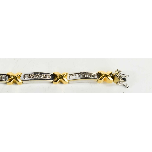 15 - An 18ct white & yellow gold and diamond bracelet, designed as series of eight diamond set white link... 