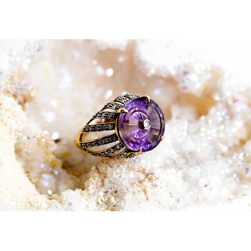 160 - A Lehrer 9ct gold and Torus ring amethyst and diamond ring, size O, 5.4g.