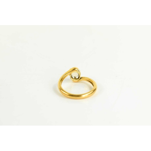 163 - A gold [tested as] and moonstone ring, the oval moonstone in a claw setting, size O, 5g.