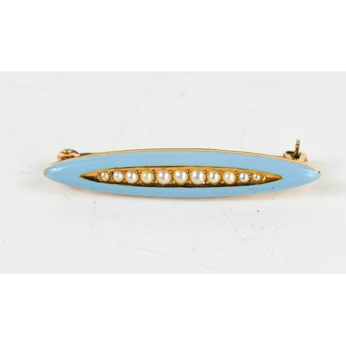 18 - A 14ct gold, turquoise enamel and seed pearl brooch of marquise form, the seed pearls set to the cen... 