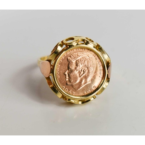 22 - A 14ct gold ring set with a gold John F Kennedy 1961 to 1963 coin, size M, 2.78g.