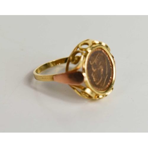 22 - A 14ct gold ring set with a gold John F Kennedy 1961 to 1963 coin, size M, 2.78g.