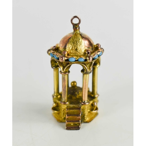 23 - A 19th century yellow and rose gold charm, in the form of an octagonal stand with steps to the front... 