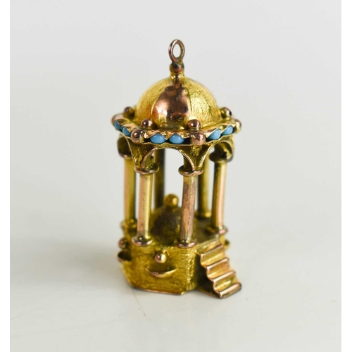 23 - A 19th century yellow and rose gold charm, in the form of an octagonal stand with steps to the front... 