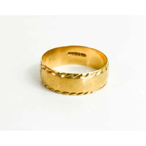 24 - A 9ct gold wedding band with rope twist decoration to the edge, size Y, 4.65g.