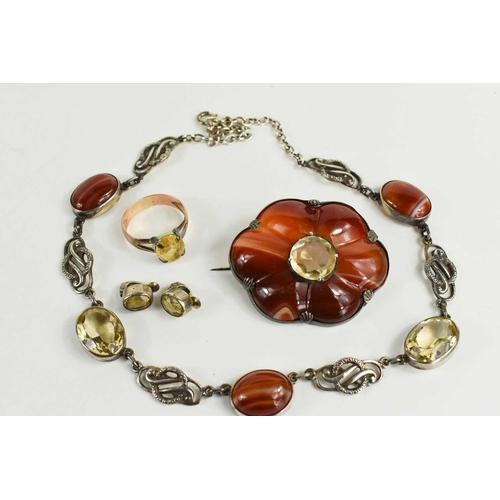 27 - A suite of Scottish agate and cairngorm set jewellery, comprising a brooch in the form of a six peta... 