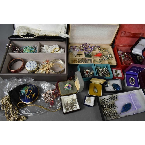 273 - A selection of jewellery and jewellery boxes, to include earrings, necklaces, brooches and bangles, ... 