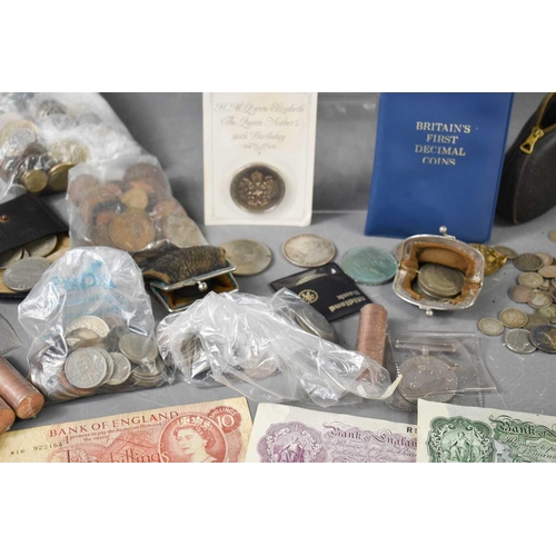 325 - A large selection of coins to include Crowns, threepennys, commemorative coins, GB and worldwide exa... 