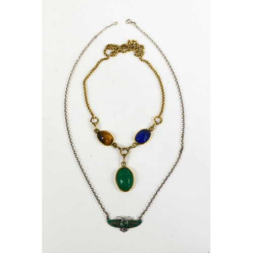 35 - Egyptian Revival interest, a three form scarab pendant of green, blue and tawny coloured stones, sus... 