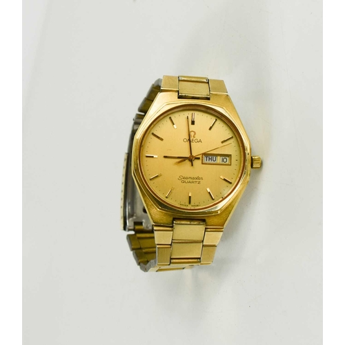 364 - A gold plated Omega Seamaster quartz watch with expanding bracelet. A/F.