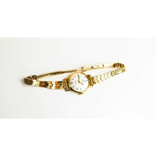 381 - A lady's vintage 9ct gold Verity watch, the signed champagne dial with baton numerals, back dedicati... 