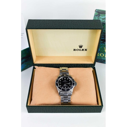 393 - A Rolex Oyster Sea Dweller wristwatch, no. 8848861, complete with the original strap, extra links, b... 