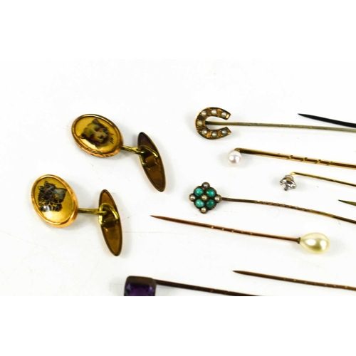 469 - A group of twelve stick stock pins including two 15ct gold Victorian examples, one set with a seed p... 