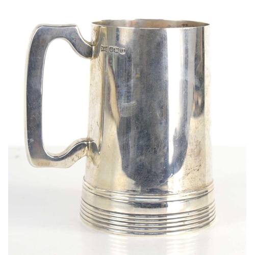 470 - A Walker and Hall silver pint tankard, of simple Art Deco tapered cylindrical form, with reeded deco... 