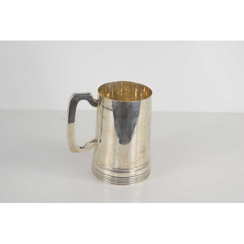 470 - A Walker and Hall silver pint tankard, of simple Art Deco tapered cylindrical form, with reeded deco... 