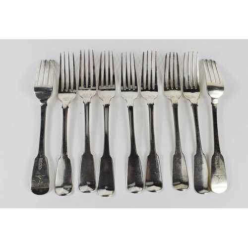 474 - A set of nine Irish silver dinner forks, by Samuel Neville, each engraved with a hand holding a liza... 