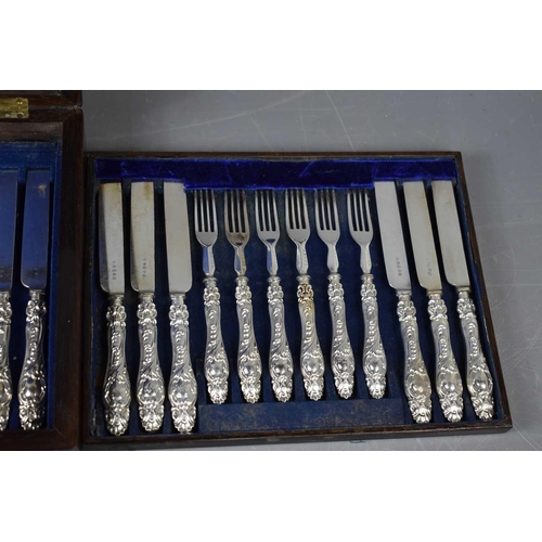 475 - A set of silver handled knives and forks by A. Hadfield, Sheffield 1860, the plated blades and fork ... 