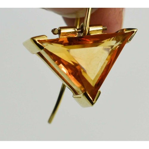 78 - A pair of modernist 18ct gold and citrine earrings, the hinged triangular drops each set with a tril... 