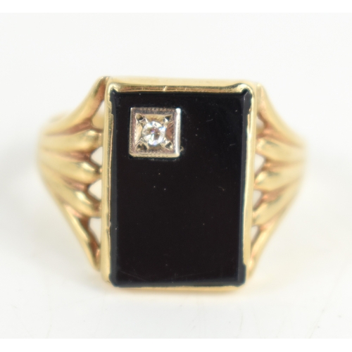 44a - A gentleman's 9ct gold, jet and diamond ring, the rectangular table of jet set with diamond to one c... 