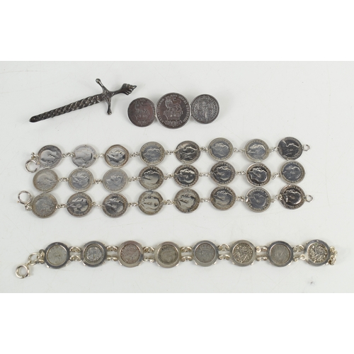 45a - A group of silver coinage jewellery comprising a brooch formed of a George III 1825 sixpence and two... 