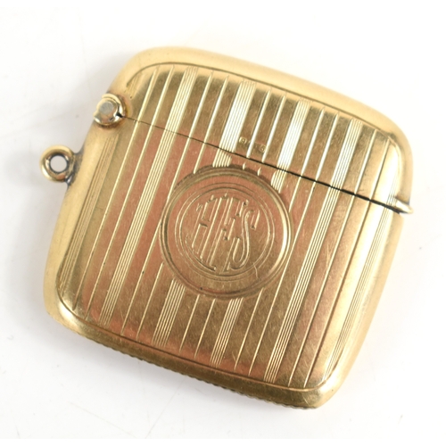 47a - A 9ct gold Edwardian vesta case, with reeded engraved decoration, monogram engraved, W & Co Ltd, Bir... 