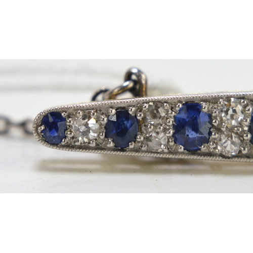 1 - An impressive diamond and cornflower blue sapphire brooch, of marquise form set with thirteen gradua... 