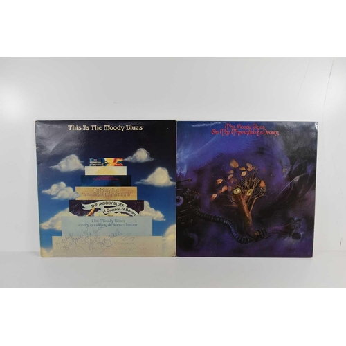 100 - Two autographed Moody Blues LP records, both signed by Justin Hayward.