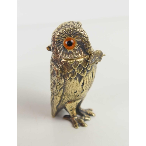 130 - A Tiffany & Co silver gilt novelty owl salt with amber glass eyes, and a hinged head, with the origi... 