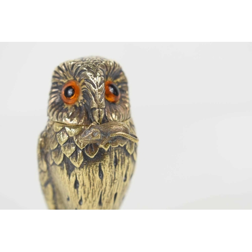 130 - A Tiffany & Co silver gilt novelty owl salt with amber glass eyes, and a hinged head, with the origi... 