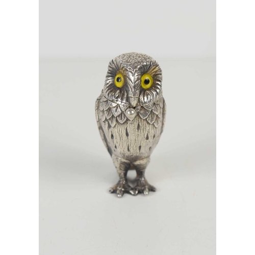 131 - A silver novelty salt in the form of an owl, with yellow glass eyes, and its original spoon, by Will... 