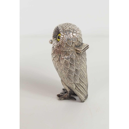 131 - A silver novelty salt in the form of an owl, with yellow glass eyes, and its original spoon, by Will... 