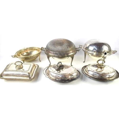 152 - A group of silver plated items to include Victorian revolving breakfast dishes, lidded tureens to in... 