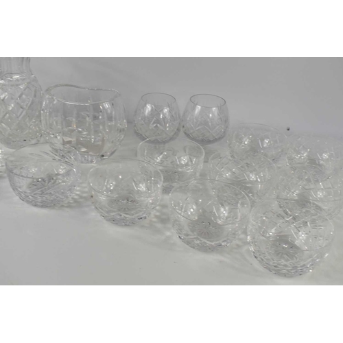 169 - A group of glasswares, including nine Waterford Crystal cut glass bowls, two vases of baluster form ... 