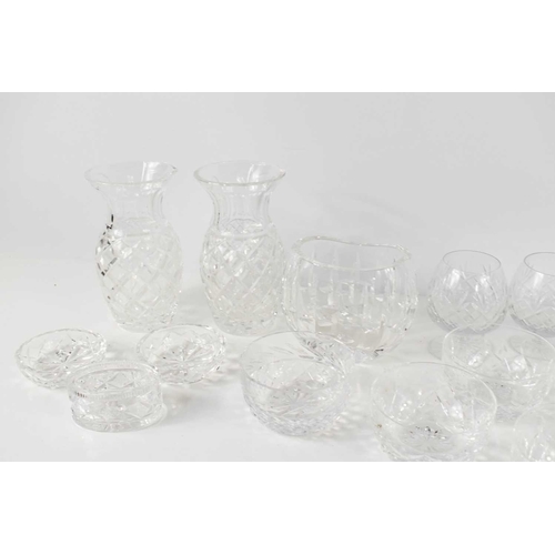 169 - A group of glasswares, including nine Waterford Crystal cut glass bowls, two vases of baluster form ... 