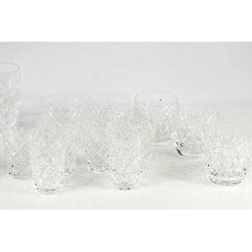 203 - A suite of Waterford Crystal comprising six champagne flutes, four red wine glasses, three white win... 