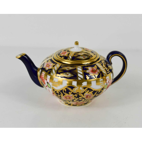 210 - A Royal Crown Derby miniature Imari pattern, teapot and cover, 1940s.