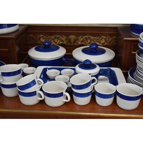 219 - A Swedish Rorstrand tea/dinner service in the Koka blue pattern, comprising of plates, cups, saucers... 