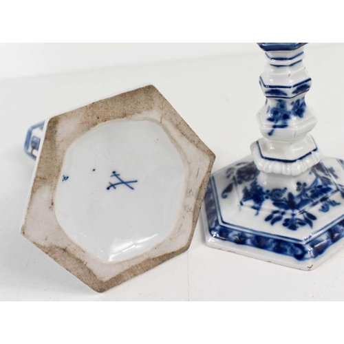 232 - A pair of Meissen blue and white candlesticks, each of hexagonal form with underglazed blue decorati... 