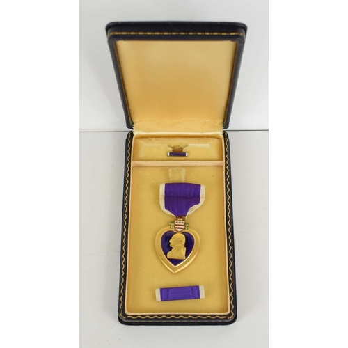 25 - A U.S Army Purple Heart medal with original fitted case.