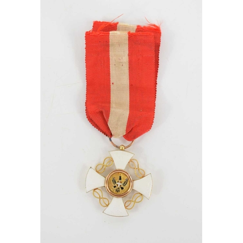 28 - An Italy Order of the Crown medal, Knight, gold and enamel decoration.