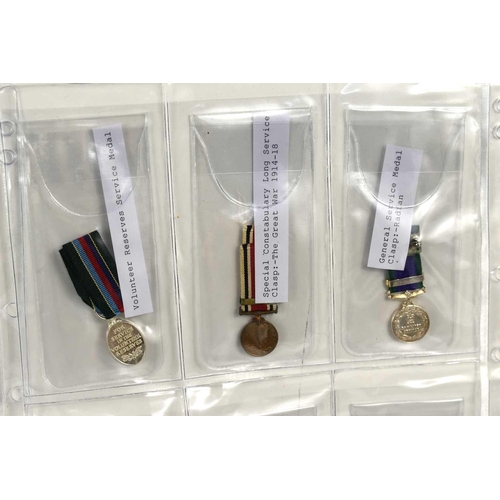 29 - A collection of miniature medals to include George V military medal, Coronation medal, Military Cros... 